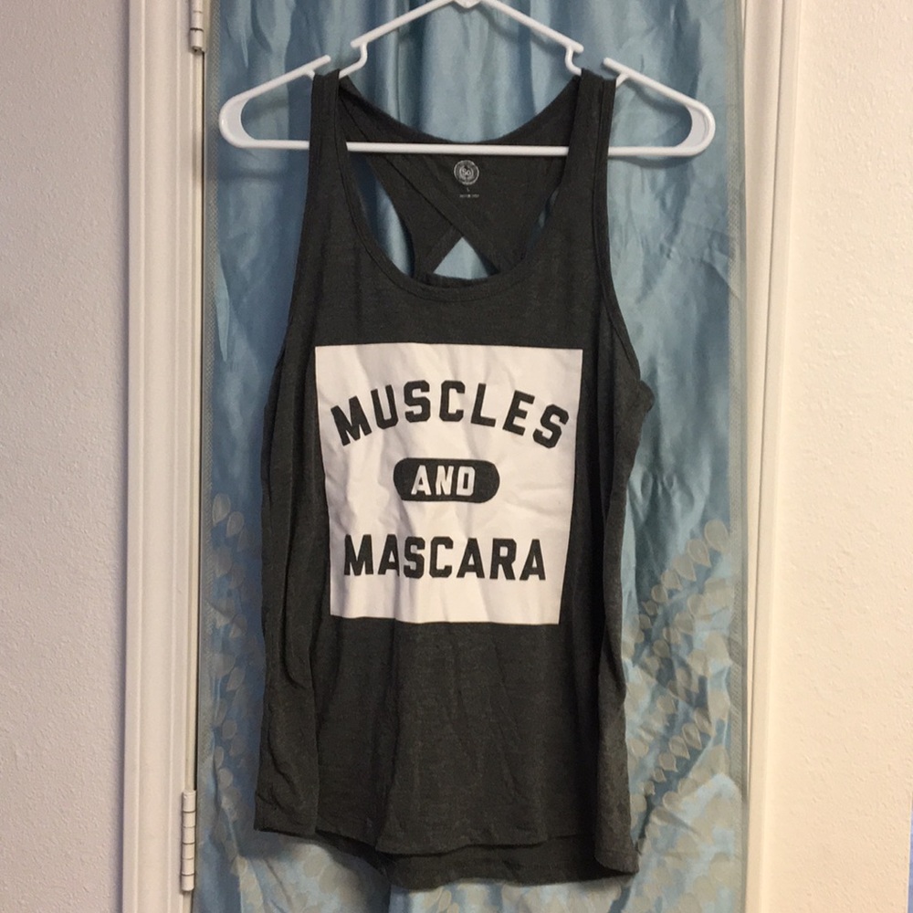 Fitness racer back muscles and mascara